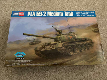 Model tank kit packaging for PLA 59-2 Medium Tank by Hobby Boss on a textured surface.